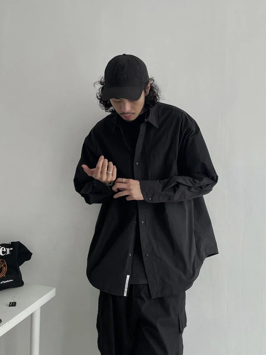 ルーズシルエット ポケット付きブラックシャツ